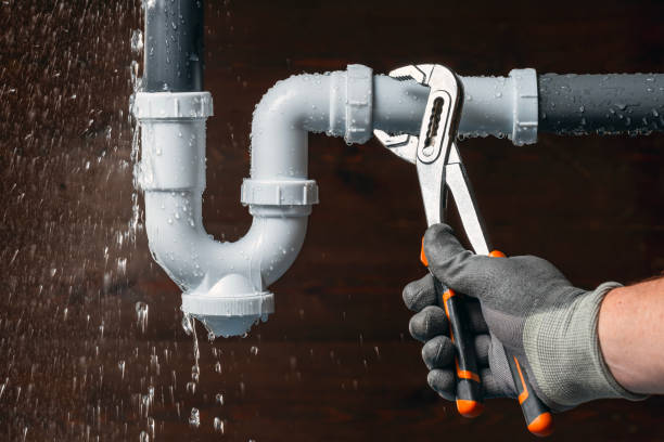 Professional Emergency Plumber technician working in Tipton, IA